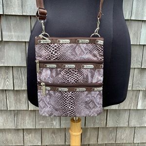 Brown and white Lesportsac Cross body purse